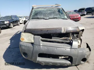 2002 Nissan Frontier SE with VIN 1N6ED27T52C383700, listed as a Copart auction lot 86204074 with 216,908 mi miles and Salvage title. Bid and sale history available at DreamBid. Image 5.