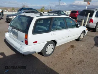 1995 Ford Escort z VIN 3FASP15J8SR142245, wystawiony jako IAAI lot #41901298 z przebiegiem 163 045 mil mil oraz . Historia ofert i sprzedaży dostępna na DreamBid. Obrazek 4.
