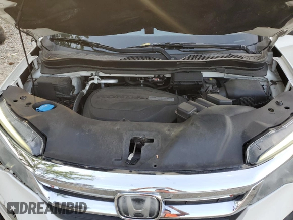 2019 Honda Pilot EX-L with VIN 5FNYF5H44KB009679, listed as a Copart auction lot 62210505 with 148,628 mi miles and Salvage title. Bid and sale history available at DreamBid. Image 12.