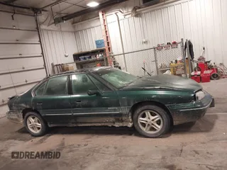 1997 Pontiac Bonneville SE z VIN 1G2HX52KXVH250272, wystawiony jako IAAI lot #41644041 z przebiegiem 160 791 mil mil oraz . Historia ofert i sprzedaży dostępna na DreamBid. Obrazek 14.