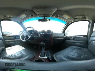 2004 GMC Envoy SLT with VIN 1GKDS13S742230325, listed as a IAAI auction lot 42385113 with 177,989 mi miles and . Bid and sale history available at DreamBid. Image 18.
