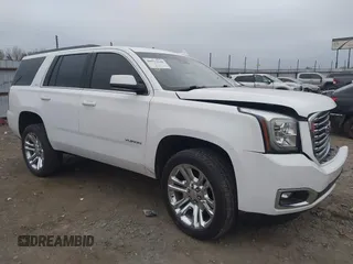 2018 GMC Yukon SLT with VIN 1GKS1BKC3JR279163, listed as a IAAI auction lot 40973940 with 122,445 mi miles. Bid and sale history available at carsss.com. Image 13.