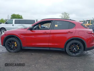 2019 Alfa Romeo Stelvio Ti with VIN ZASPAKBN1K7C49148, listed as a IAAI auction lot 42205054 with 47,338 mi miles and . Bid and sale history available at DreamBid. Image 14.