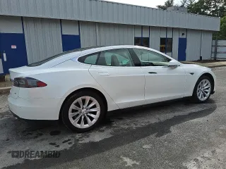 2013 Tesla Model S с VIN 5YJSA1CN1DFP27626, выставлен на аукционе Copart как лот 56697935 с пробегом 137 962 миль миль и Чистый • Clean title. История ставок и продаж доступна на DreamBid. Изображение 3.