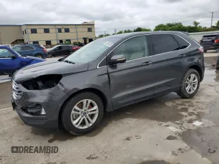 2019 Ford Edge SEL z VIN 2FMPK4J92KBB21770, wystawiony jako Copart lot #56056585 z przebiegiem 64 042 mil mil oraz Szkoda całkowita • Salvage title. Historia ofert i sprzedaży dostępna na DreamBid. Obrazek 1.