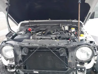 2019 Jeep Wrangler Unlimited Sport Altitude with VIN 1C4HJXDG3KW528647, listed as a IAAI auction lot 40986538 with 85,381 mi miles and . Bid and sale history available at DreamBid. Image 10.
