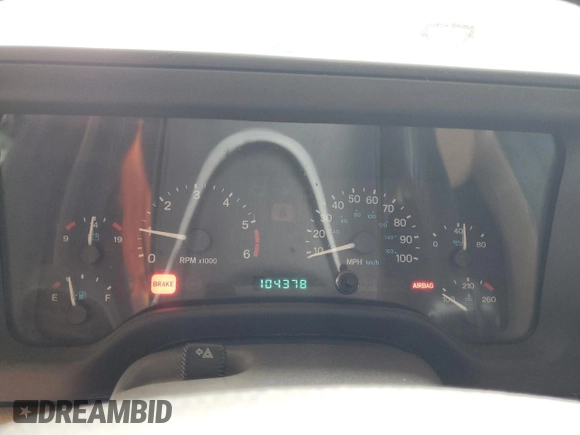 1999 Jeep Wrangler Sahara with VIN 1J4FY49S0XP435949, listed as a Copart auction lot 44937625 with 104,378 mi miles and Salvage Title. Bid and sale history available at carsss.com. Image 9.