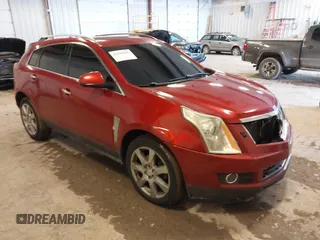 2011 Cadillac SRX Premium Collection z VIN 3GYFNFEYXBS568338, wystawiony jako IAAI lot #41689946 z przebiegiem 163 013 mil mil oraz . Historia ofert i sprzedaży dostępna na DreamBid. Obrazek 1.
