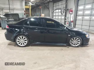 2011 Mitsubishi Lancer GTS with VIN JA32U8FW7BU034390, listed as a IAAI auction lot 41643536 with 130,319 mi miles and . Bid and sale history available at carsss.com. Image 13.