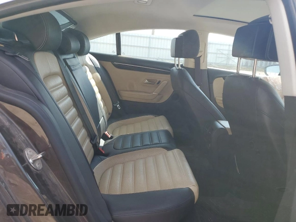 2014 Volkswagen CC VR6 Executive 4Motion with VIN WVWGU7AN9EE523145, listed as a Copart auction lot 71419134 with 94,547 mi miles and Salvage Title. Bid and sale history available at carsss.com. Image 10.