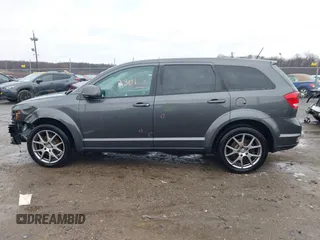 2015 Dodge Journey R/T z VIN 3C4PDDEG4FT680609, wystawiony jako IAAI lot #41733309 z przebiegiem 124 121 mil mil oraz . Historia ofert i sprzedaży dostępna na DreamBid. Obrazek 14.