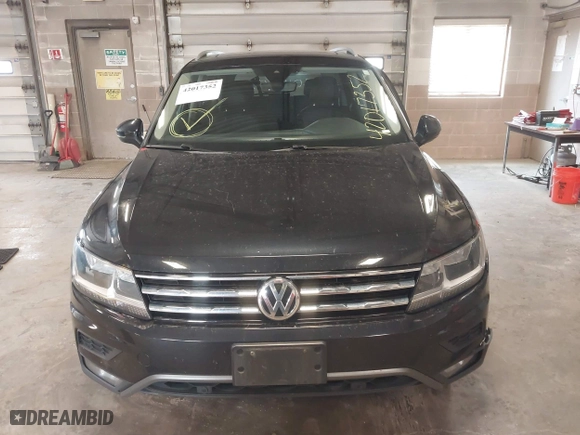 2020 Volkswagen Tiguan SE with VIN 3VV2B7AX4LM115131, listed as a IAAI auction lot 42017352 with 87,909 mi miles. Bid and sale history available at carsss.com. Image 12.