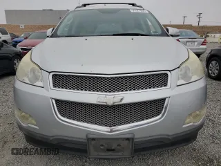 2012 Chevrolet Traverse LTZ z VIN 1GNKRLED8CJ262091, wystawiony jako Copart lot #55527805 z przebiegiem Nie podano mil oraz Szkoda całkowita • Salvage title. Historia ofert i sprzedaży dostępna na DreamBid. Obrazek 5.