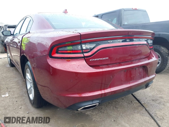 2023 Dodge Charger SXT with VIN 2C3CDXBG9PH659726, listed as a IAAI auction lot 42103636 with 14,321 mi miles and . Bid and sale history available at DreamBid. Image 3.