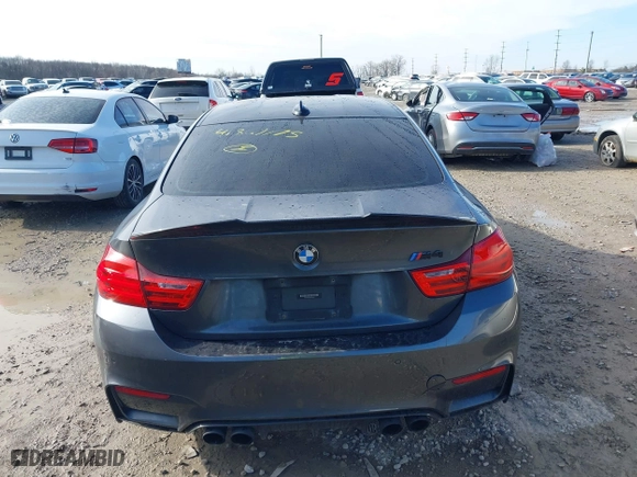 2015 BMW M4 with VIN WBS3R9C57FK334921, listed as a IAAI auction lot 41869773 with 107,058 mi miles. Bid and sale history available at carsss.com. Image 16.
