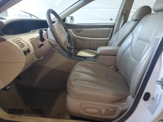 2003 Toyota Avalon XL z VIN 4T1BF28B53U321615, wystawiony jako Copart lot #52852895 z przebiegiem 218 633 mil mil oraz Szkoda całkowita • Salvage title. Historia ofert i sprzedaży dostępna na DreamBid. Obrazek 7.