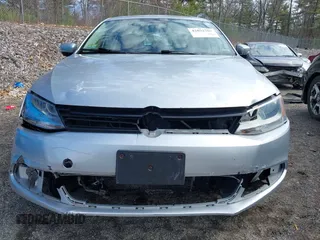 2011 Volkswagen Jetta SE z VIN 3VWDZ7AJ9BM367581, wystawiony jako IAAI lot #42032765 z przebiegiem 136 472 mil mil oraz . Historia ofert i sprzedaży dostępna na DreamBid. Obrazek 13.