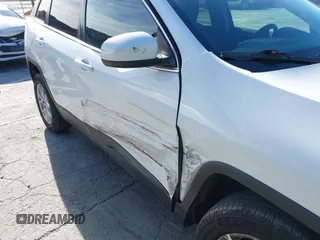 2016 Jeep Cherokee Latitude with VIN 1C4PJLCB9GW149217, listed as a IAAI auction lot 41365164 with 144,702 mi miles. Bid and sale history available at carsss.com. Image 6.