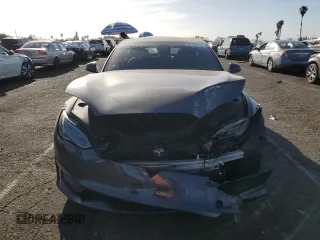 2023 Tesla Model S с VIN 5YJSA1E55PF522232, выставлен на аукционе Copart как лот 47735815 с пробегом Не указан миль и Списание • Salvage title. История ставок и продаж доступна на DreamBid. Изображение 5.