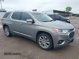 2018 Chevrolet Traverse Premier z VIN 1GNERKKW6JJ274900, wystawiony jako IAAI lot #42103376 z przebiegiem 106 611 mil mil oraz . Historia ofert i sprzedaży dostępna na DreamBid. Obrazek 1.