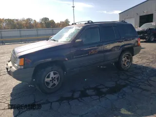 1998 Jeep Grand Cherokee Laredo with VIN 1J4GZ58S8WC167716, listed as a Copart auction lot 76477694 with 167,519 mi miles and Salvage Title. Bid and sale history available at carsss.com. Image 1.