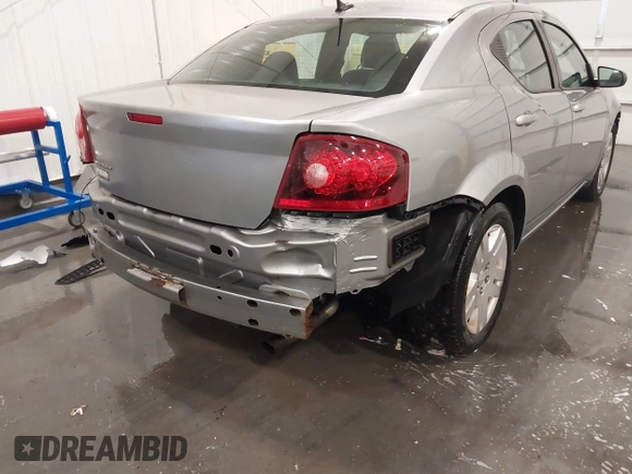 2014 Dodge Avenger SE z VIN 1C3CDZAB4EN228880, wystawiony jako IAAI lot #41605761 z przebiegiem 97 437 mil mil oraz . Historia ofert i sprzedaży dostępna na DreamBid. Obrazek 6.