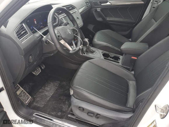 2022 Volkswagen Tiguan SE R-Line Black with VIN 3VVCB7AX0NM169257, listed as a Copart auction lot 43129745 with 59,517 mi miles and Salvage Title. Bid and sale history available at carsss.com. Image 7.
