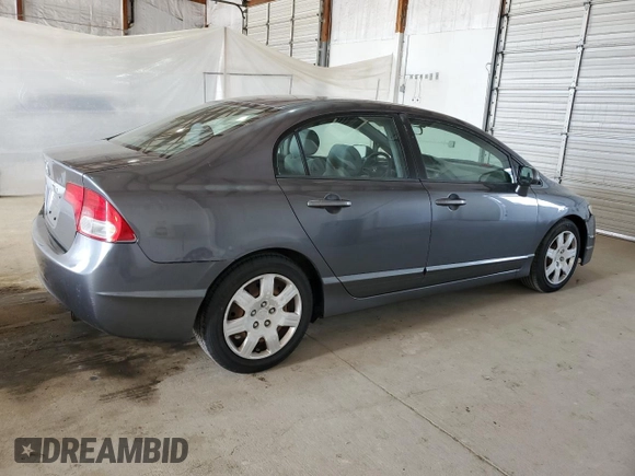 2010 Honda Civic LX with VIN 2HGFA1F53AH326745, listed as a Copart auction lot 54731085 with 196,697 mi miles and Clean Title. Bid and sale history available at DreamBid. Image 3.