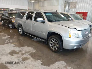 2012 GMC Yukon XL Denali with VIN 1GKS2MEF1CR198938, listed as a IAAI auction lot 41606164 with 232,787 mi miles. Bid and sale history available at carsss.com. Image 1.