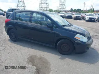 2009 Nissan Versa 1.8 S with VIN 3N1BC13EX9L383932, listed as a IAAI auction lot 42160535 with 192,779 mi miles. Bid and sale history available at carsss.com. Image 1.