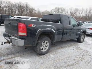 2009 GMC Sierra 1500 SLE with VIN 1GTEK29099Z296837, listed as a IAAI auction lot 41604029 with 198,881 mi miles and . Bid and sale history available at DreamBid. Image 4.