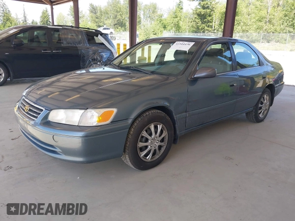 2000 Toyota Camry CE z VIN JT2BG22KXY0406984, wystawiony jako IAAI lot #42344436 z przebiegiem 234 729 mil mil oraz . Historia ofert i sprzedaży dostępna na DreamBid. Obrazek 17.