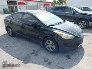 2015 Hyundai Elantra Limited with VIN KMHDH4AE7FU385081, listed as a IAAI auction lot 41911165 with 124,052 mi miles. Bid and sale history available at carsss.com. Image 1.