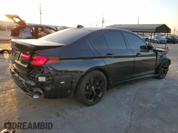 2023 BMW 5 Series 530e with VIN WBA13AG02PCN09018, listed as a Copart auction lot 85255124 with 34,015 mi miles and Clean title. Bid and sale history available at DreamBid. Image 3.