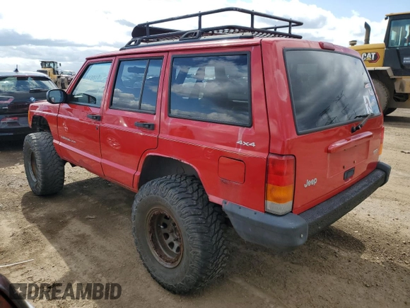 2000 Jeep Cherokee with VIN 1J4FF48S0YL113246, listed as a Copart auction lot 51861455 with 180,965 mi miles and Clean title. Bid and sale history available at DreamBid. Image 2.