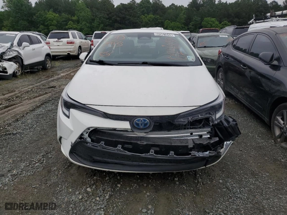2024 Toyota Corolla Hybrid LE with VIN JTDBCMFE2RJ024933, listed as a Copart auction lot 52501045 with 19,674 mi miles and Clean Title. Bid and sale history available at carsss.com. Image 5.