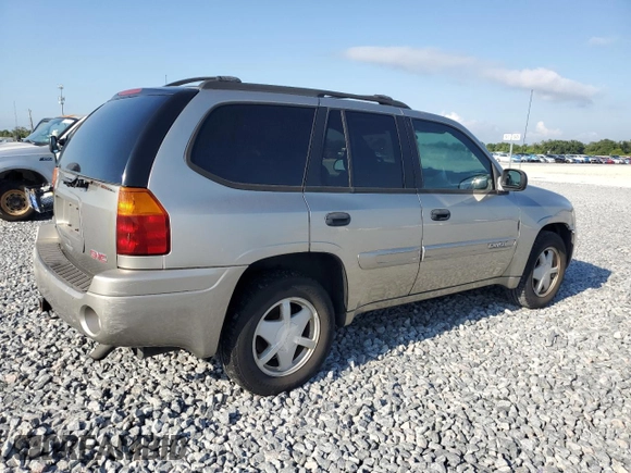 2003 GMC Envoy SLT z VIN 1GKDS13S032373020, wystawiony jako Copart lot #54986765 z przebiegiem 235 711 mil mil oraz Tytuł czysty. Historia ofert i sprzedaży dostępna na DreamBid. Obrazek 3.