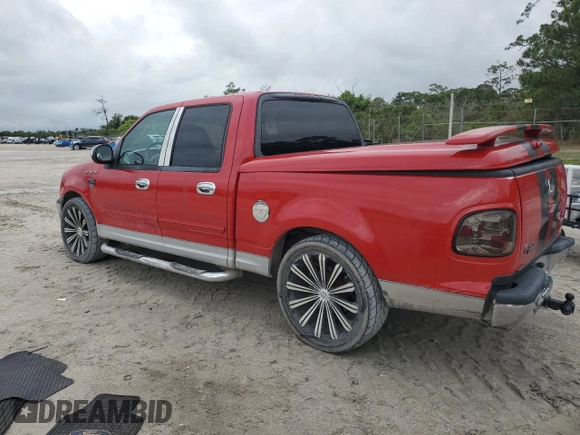 2003 Ford F-150 XLT with VIN 1FTRW07643KB48614, listed as a Copart auction lot 51895905 with 157,290 mi miles and Salvage Title. Bid and sale history available at carsss.com. Image 2.