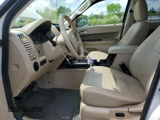 2012 Ford Escape Limited z VIN 1FMCU0EG5CKC78503, wystawiony jako Copart lot #56742405 z przebiegiem 138 324 mil mil oraz Szkoda całkowita • Salvage title. Historia ofert i sprzedaży dostępna na DreamBid. Obrazek 7.