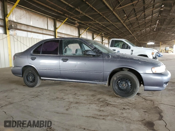 1999 Nissan Sentra XE with VIN 1N4AB41D7XC700507, listed as a Copart auction lot 44410765 with 91,655 mi miles and Salvage title. Bid and sale history available at DreamBid. Image 4.