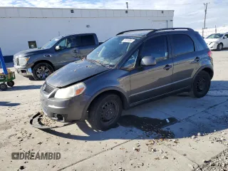 2010 Suzuki SX4 z VIN JS2YA5A35A6301406, wystawiony jako Copart lot #81810084 z przebiegiem 134 349 mil mil oraz Szkody całkowita. Historia ofert i sprzedaży dostępna na DreamBid. Obrazek 1.