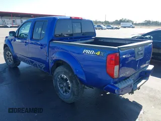 2014 Nissan Frontier SV with VIN 1N6AD0EV4EN720325, listed as a IAAI auction lot 41479133 with 61,661 mi miles and . Bid and sale history available at DreamBid. Image 3.