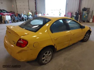 2004 Dodge Neon SXT with VIN 1B3ES56C14D621133, listed as a IAAI auction lot 42095446 with 147,120 mi miles. Bid and sale history available at carsss.com. Image 4.