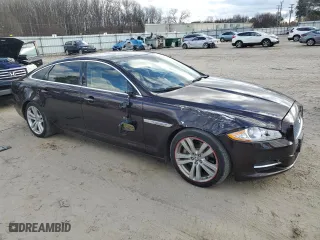2013 Jaguar XJ with VIN SAJWA2G12DLV57581, listed as a Copart auction lot 84736054 with 91,779 mi miles and Salvage Title. Bid and sale history available at carsss.com. Image 4.