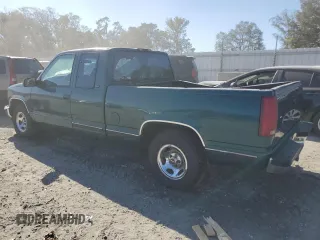 1996 GMC Sierra 1500 with VIN 2GTEC19W4T1542916, listed as a Copart auction lot 75097274 with 310,745 mi miles and Salvage Title. Bid and sale history available at DreamBid. Image 2.