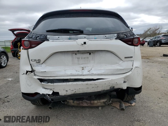 2020 Mazda CX-5 Touring z VIN JM3KFBCM8L1789067, wystawiony jako Copart lot #54953015 z przebiegiem 134 306 mil mil oraz Nie do naprawy • Non repairable. Historia ofert i sprzedaży dostępna na DreamBid. Obrazek 6.