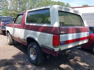 1989 Ford Bronco XL with VIN 1FMEU15N8KLB48656, listed as a IAAI auction lot 42142524 with 87,459 mi miles. Bid and sale history available at carsss.com. Image 3.