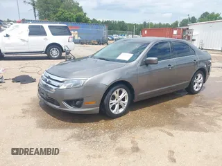 2012 Ford Fusion SE with VIN 3FAHP0HA7CR417511, listed as a IAAI auction lot 42436962 with 266,721 mi miles and . Bid and sale history available at DreamBid. Image 2.