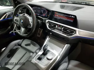 2021 BMW 4 Series M440i xDrive with VIN WBA13AR0XMCG68638, listed as a Copart auction lot 52142695 with 57,299 mi miles and Salvage Title. Bid and sale history available at DreamBid. Image 8.
