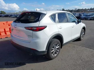 2023 Mazda CX-5 2.5 S Select Package with VIN JM3KFBBM9P0142478, listed as a IAAI auction lot 41724596 with 9,518 mi miles. Bid and sale history available at carsss.com. Image 4.